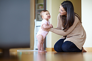 cute mom and her baby at home