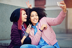 girls taking a selfie