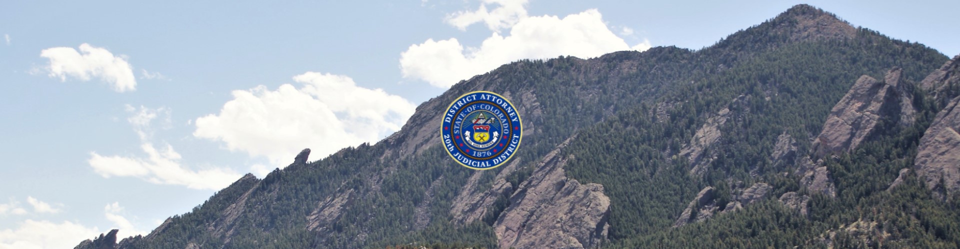 Flatirons with District Attorney logo.
